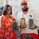 Sharene Wood (L) poses with two liquors from her “Bespoke Spirits” line at Harlem Eat Up